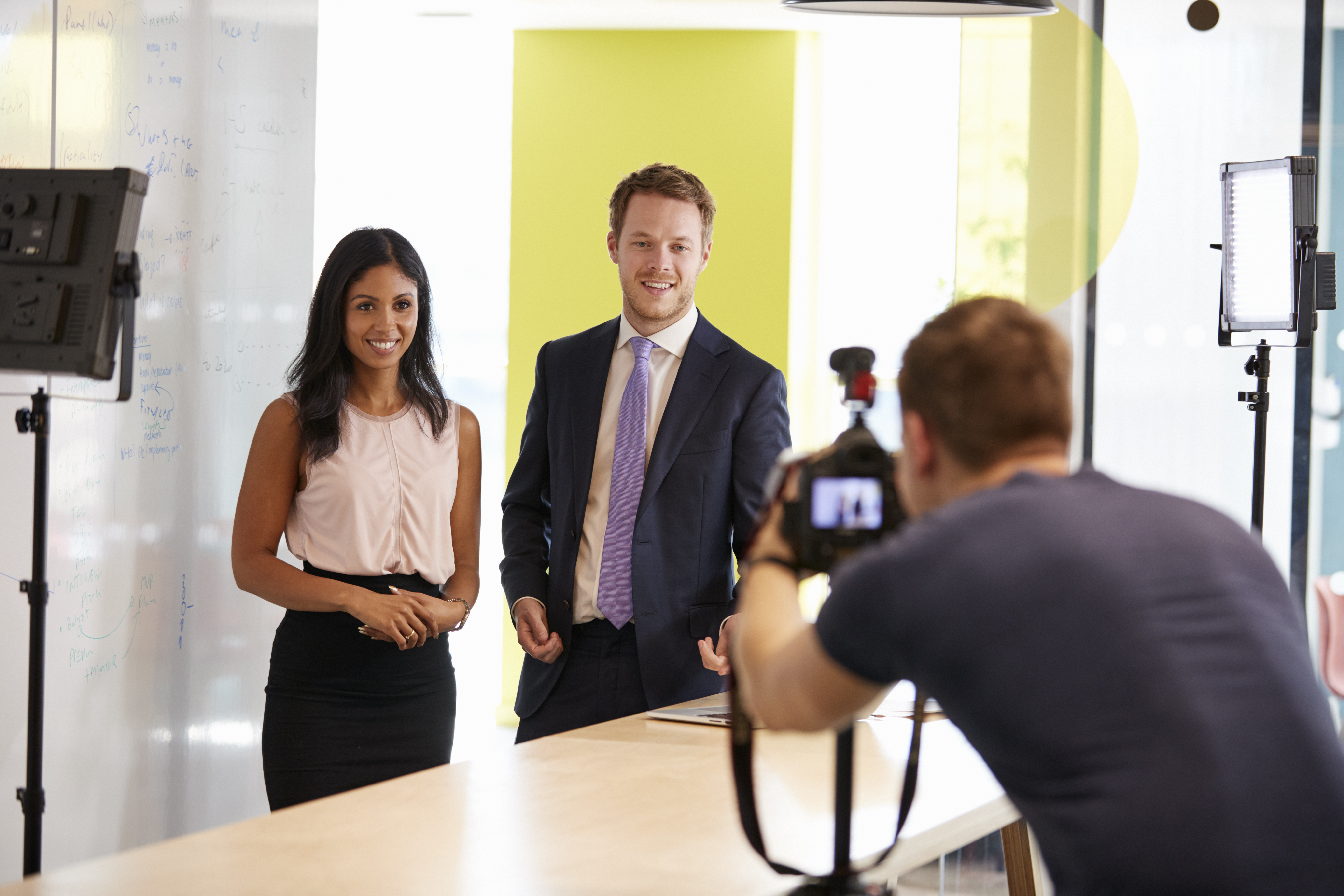 Three people making a corporate demonstration video